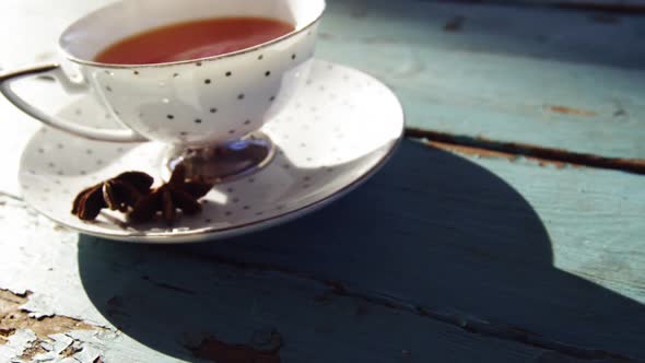 Close-up of a tomato soup on a plank alt