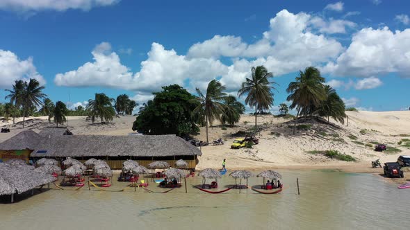 Sand dunes mountains and rain water lagoons at northeast brazilian paradise. alt