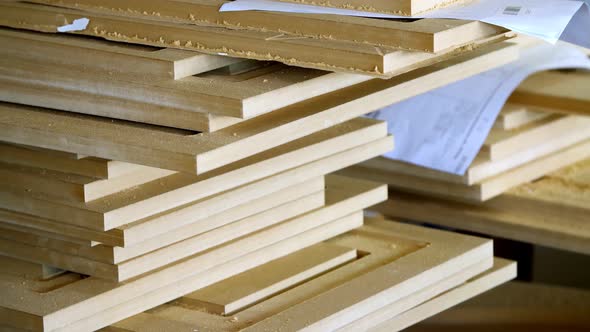 Close-up. Wooden, MDF Details. Furniture Factory. The Manufacture of Furniture Facades. Wooden alt