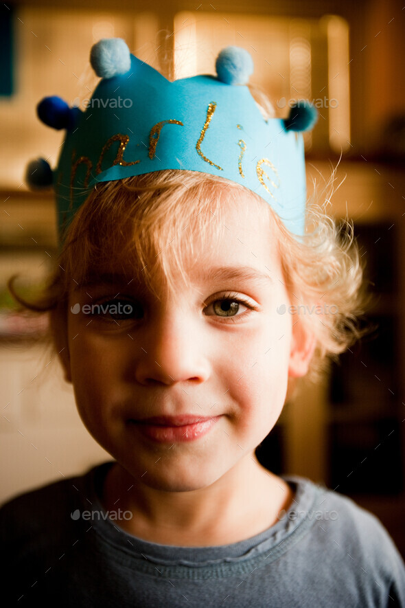 Boy wearing paper crown Stock Photo by ImageSourceCur | PhotoDune