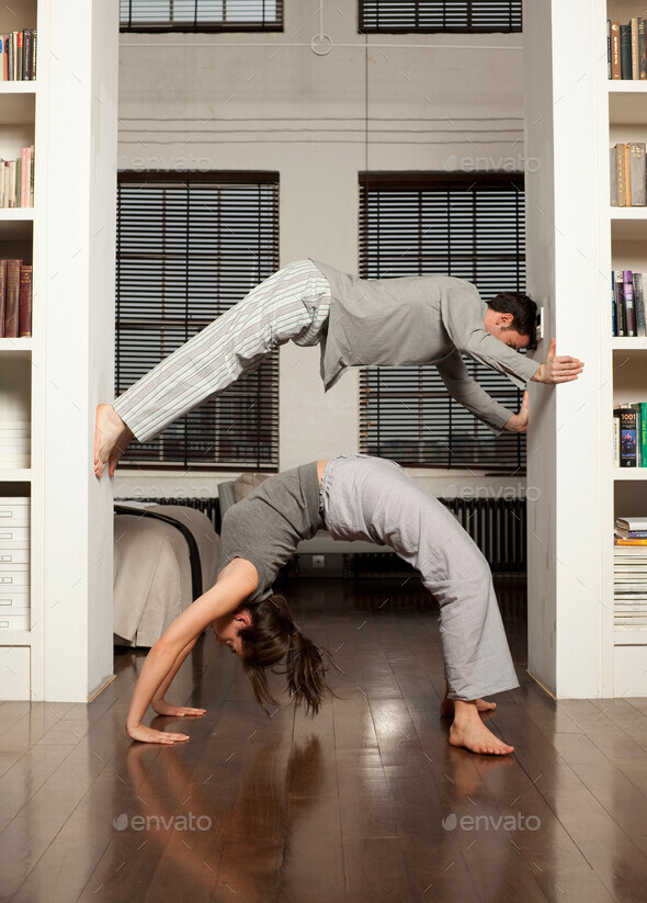couple exercising in house