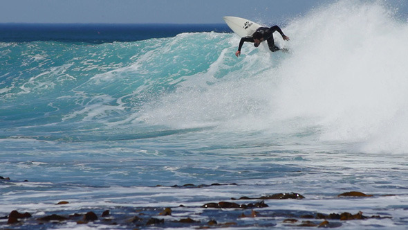 Surfer In Motion