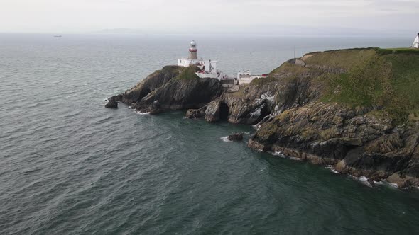 Aerial View Of Baily Lighthouse, Howth, County Dublin, Ireland - drone shot alt