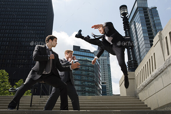 Businessmen fighting - Stock Photo - Images