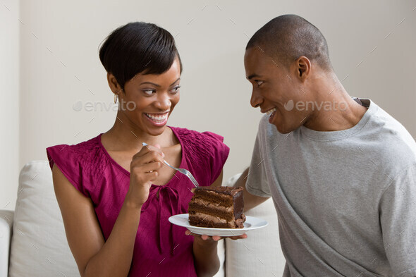 A couple sharing a cake