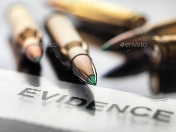Bullets sitting on evidence bag in lab