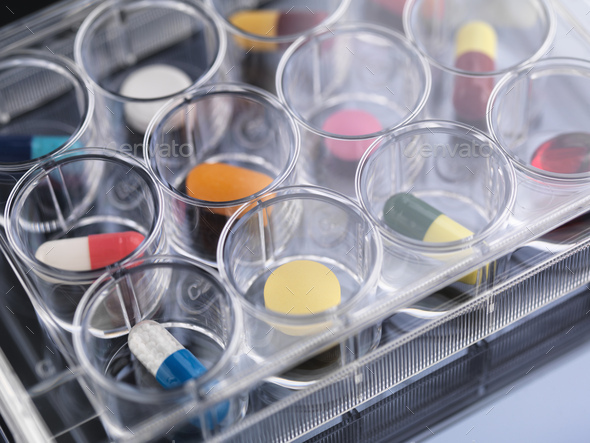 Pharmaceutical research, close up of variety of medical drugs in a multi well tray for laboratory