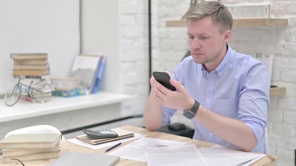 Businessman Using Smart Phone alt