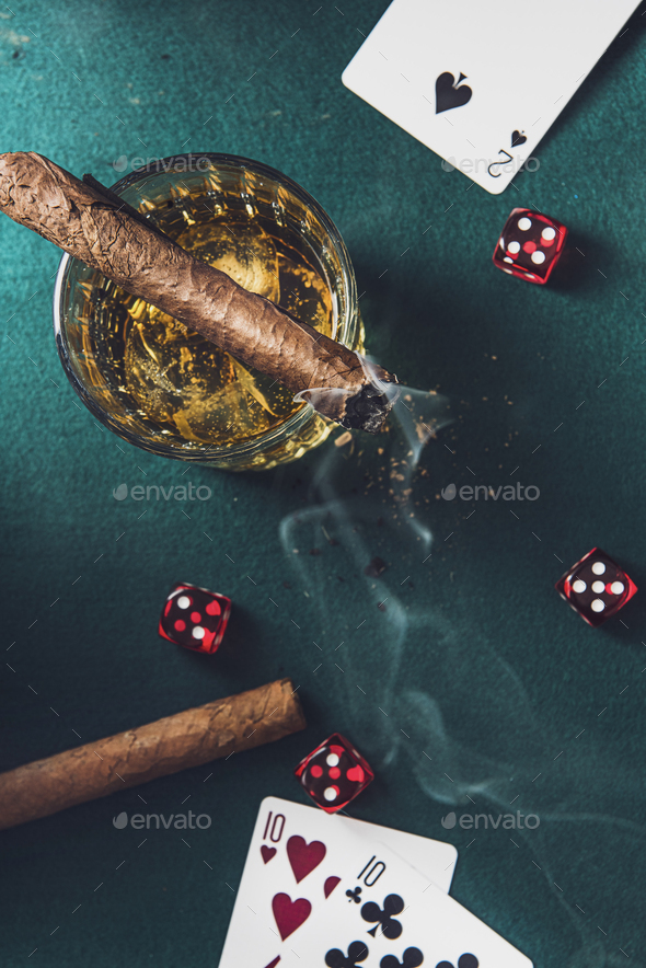 Smoking Cigar While Play Roulette or Poker Game for Money