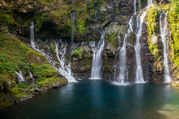 Rainforest waterfall flowing over rocks, Reunion Island
