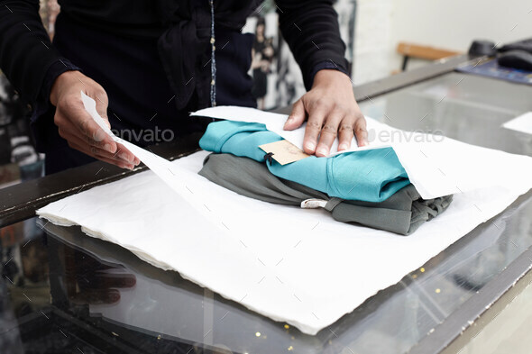 Wrapping clothes - Stock Photo - Images