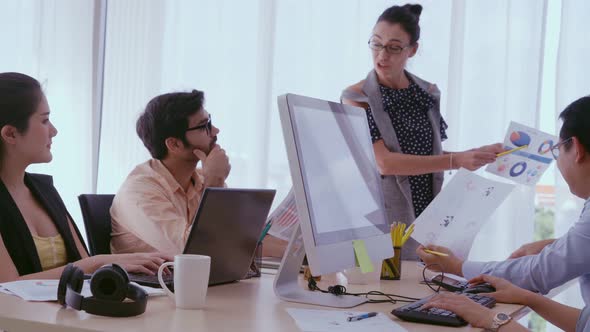 Senior Leader Giving Advice Speech to Team Members alt