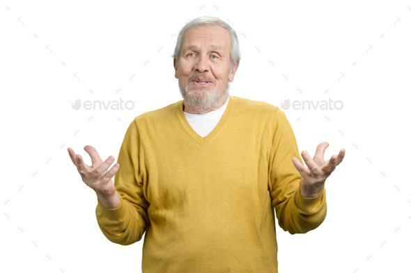 Old man gesturing while speaking.