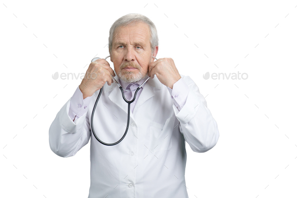 Portrait of doctor put on stethoscope.