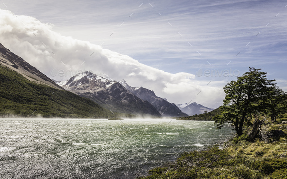 Misty river in mountain valley in Los Glaciares National Park, Patagonia, Argentina - Stock Photo - Images