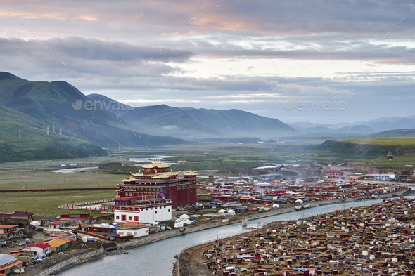 Elevated view of river and valley town, Baiyu, Sichuan, China