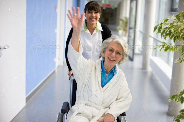 Old woman in a wheel chair and nurse