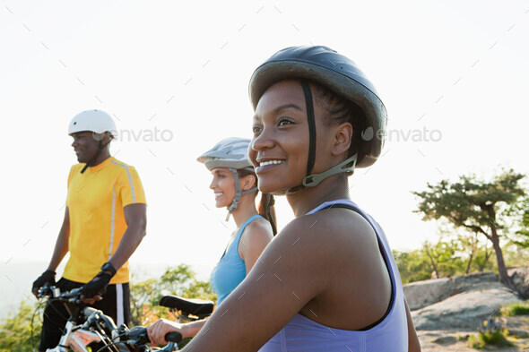 Three cyclists, rural scene