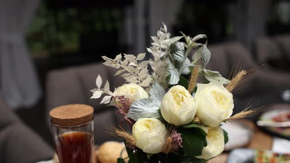 decor from a bouquet of flowers on a table in a restaurant