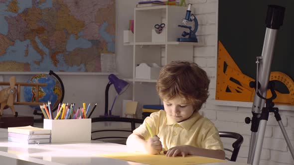 Kids Gets Ready for School. Child Near Chalkboard in School Classroom. Educational Process alt