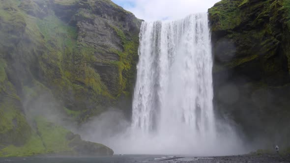 Skogafoss waterfall in Iceland, bottom view, super slow motion shot alt