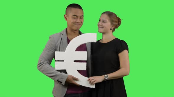 Couple holding euro symbol