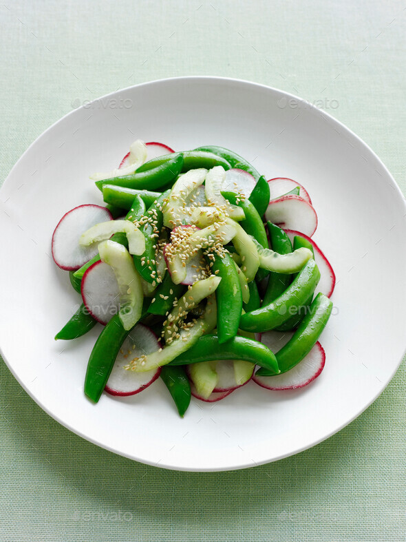 Plate of radish and snow pea salad Stock Photo by Image-Source | PhotoDune