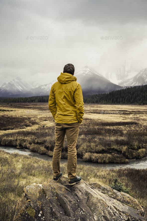 Man standing, looking at view, rear view, Kananaskis Country, Bow Valley Provincial Park, Kananaskis