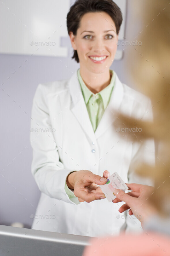 paying-for-dental-treatment-stock-photo-by-image-source-photodune