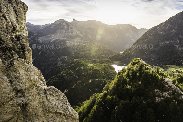 Sunlit mountain valley landscape and rock formations, Futaleufu, Los Lagos region, Chile