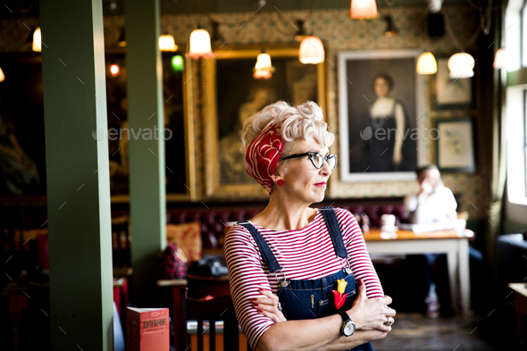 Quirky woman in bar and restaurant, Bournemouth, England