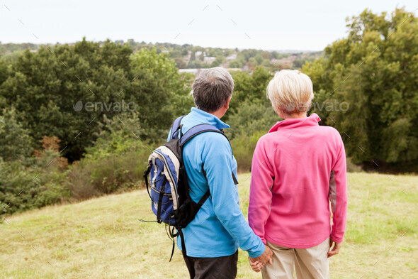 Mature couple looking out over valley
