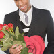 Smiling man holding a bunch of roses - PhotoDune Item for Sale