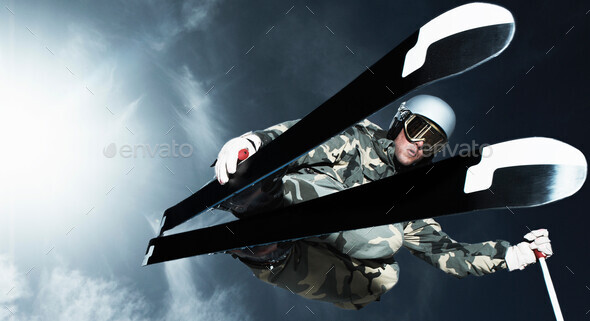 Skier jumping low angle - Stock Photo - Images