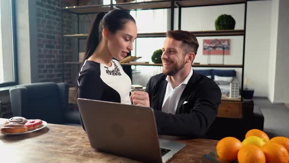 Young Beautiful Woman Talks with Handsome Man in Apartment alt