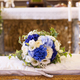 Wedding bouquet over the grooms bench - PhotoDune Item for Sale