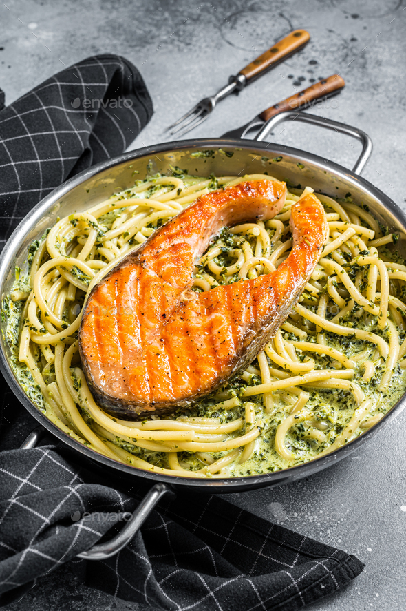 Florentine pasta with creamy spinach sauce and grilled salmon steak