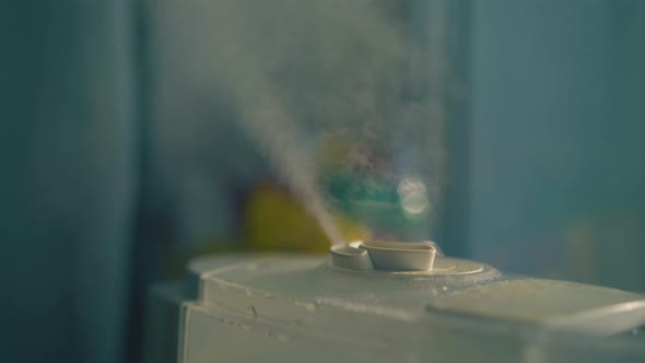 Home Air Ionizer with Wet Steam Cloud Used to Humidify Air alt