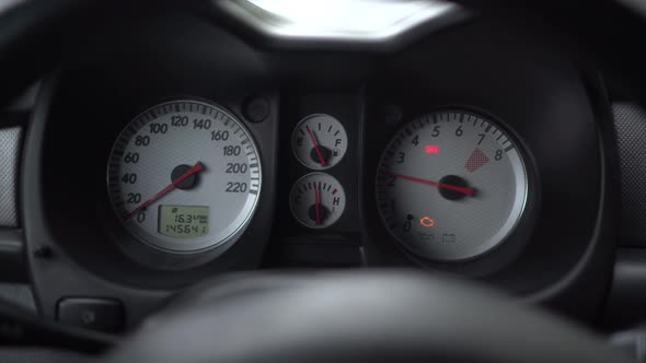 Car Dashboard with Indicators and Gauges alt