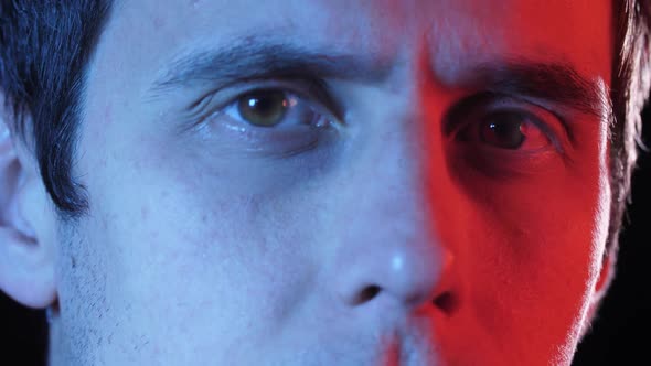 Сhipped Man Looks To the Camera alt