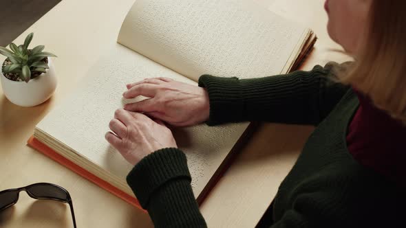 Blind Woman Reading Braille Book Top View Poorly Seeing Female Person Learning to Read Home alt