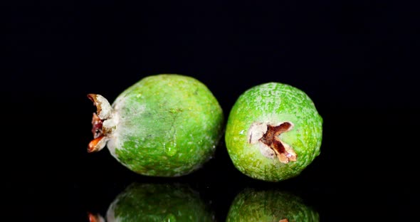 Two Whole Fresh Feijoa Slowly Rotate alt