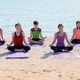 Group of People Meditation Making Sitting Yoga Pose in Luxury