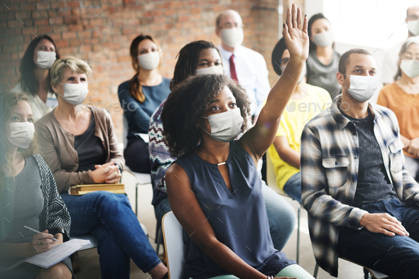People wearing mask during workshop in the new normal - Stock Photo - Images