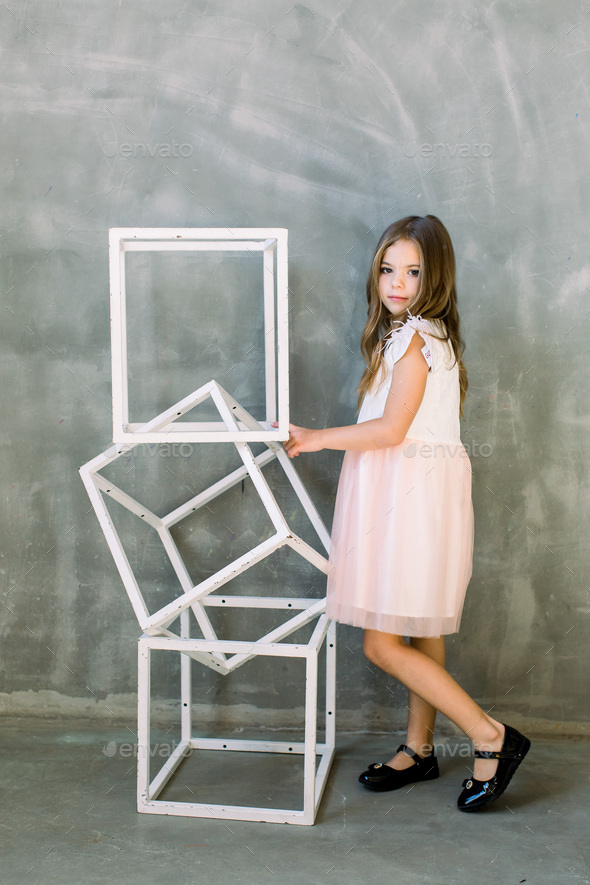 Portrait of an adorable toddler girl wearing fashion clothes