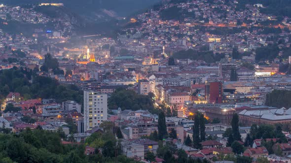 Aerial view of the historic part of Sarajevo city day to night timelapse. alt
