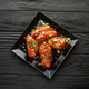 Chicken wings. Traditional asian recipe. Dark background. Copy space. Top view. - PhotoDune Item for Sale