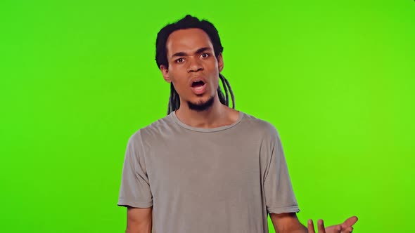 African American Man Has Shocked Expression, Exclaims He Is Not Guilty alt