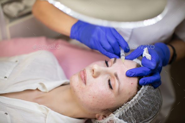 Mesotherapy, botulinum therapy, biorevitalization or plasma lifting of face skin.