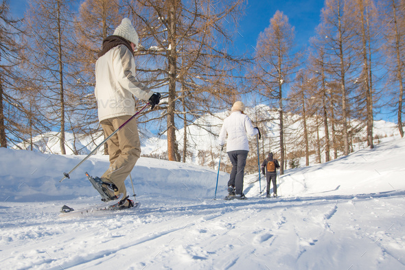 Walk in the snow with snowshoes - Stock Photo - Images